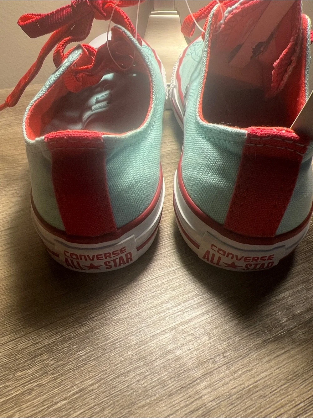 Converse Mint Green Low-Top Sneakers with Pink and Red Laces